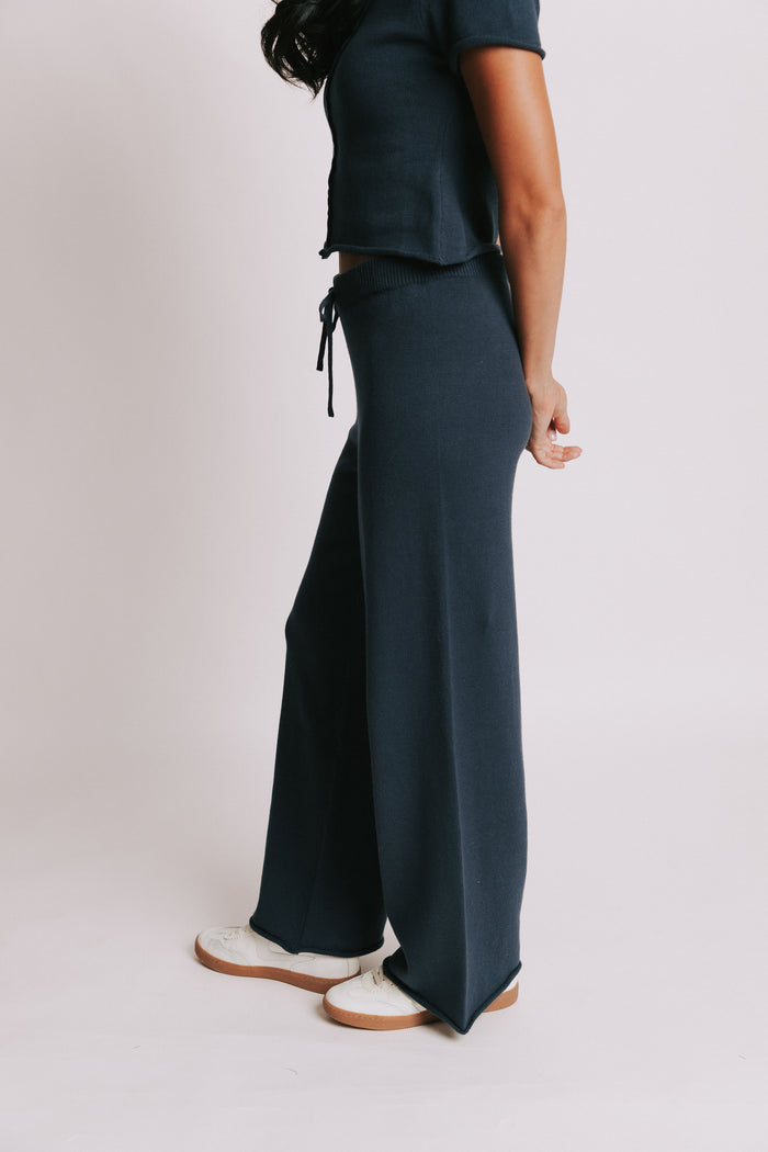 navy wide leg knit pants with rolled edges side