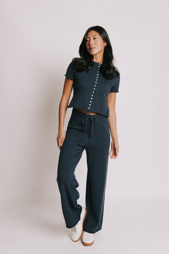 navy wide leg knit pants with rolled edges full