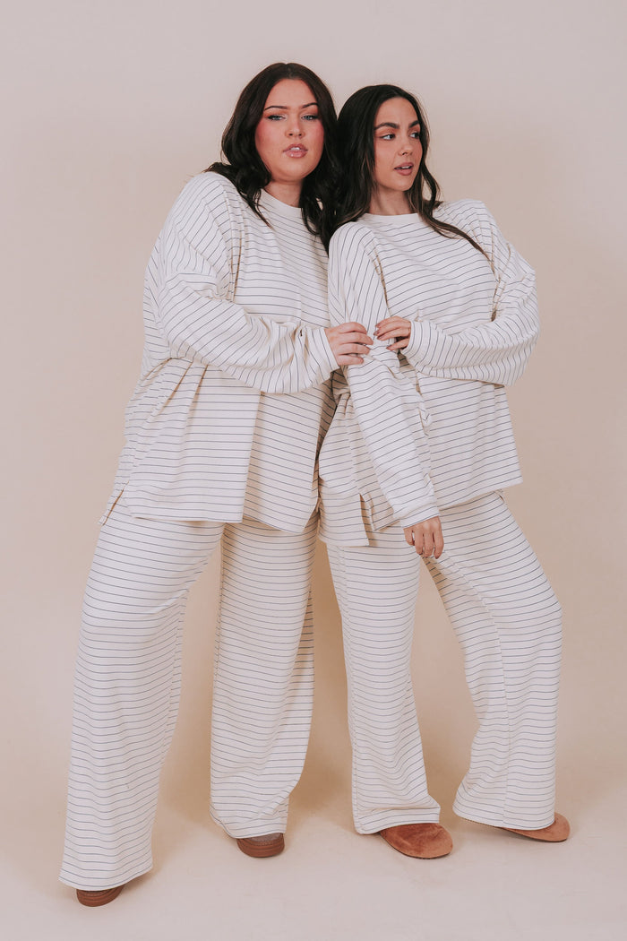 ivory and blue striped oversized long sleeve top models