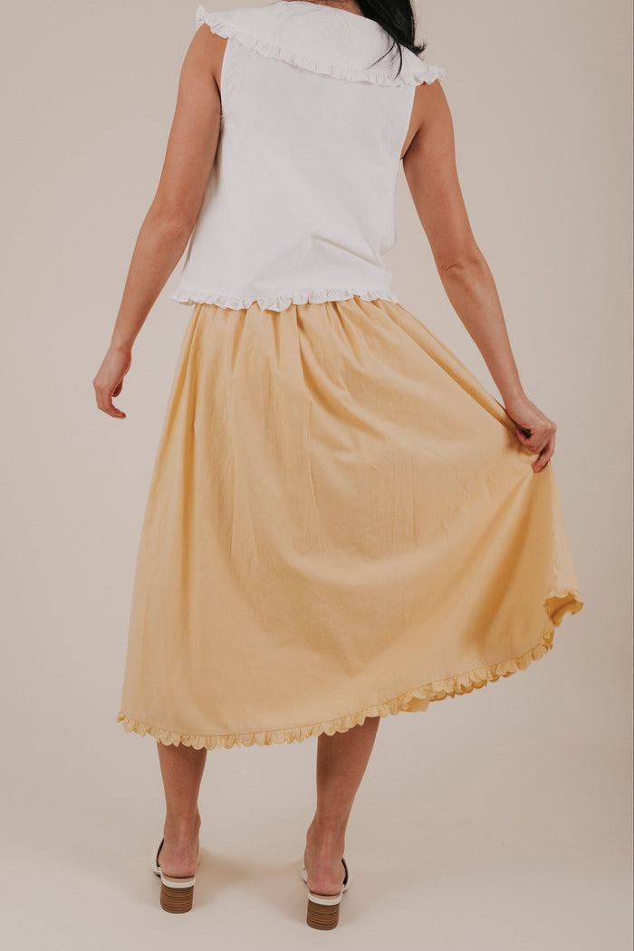 mustard yellow ruffle midi skirt back