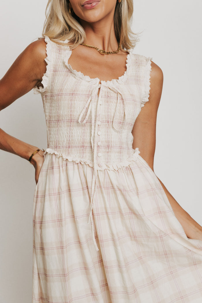 plaid midi dress with eyelet lace trim on bodice front