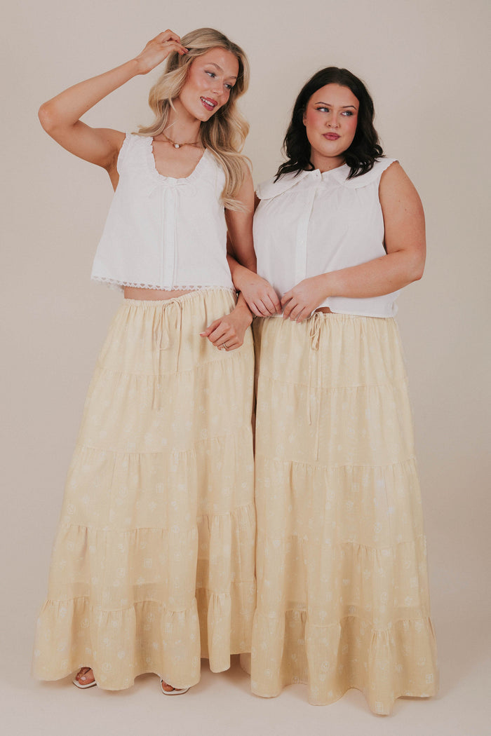 yellow spring print tiered maxi skirt models pose