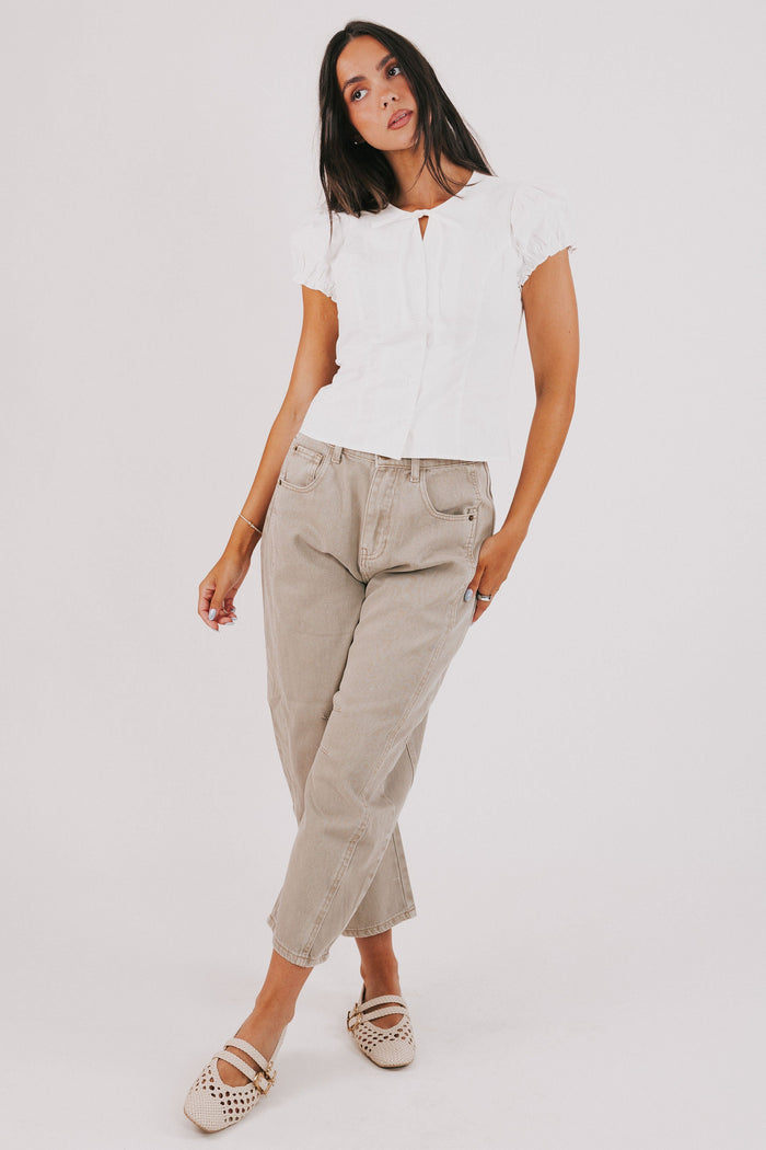 white top with puff sleeves and bow keyhole full