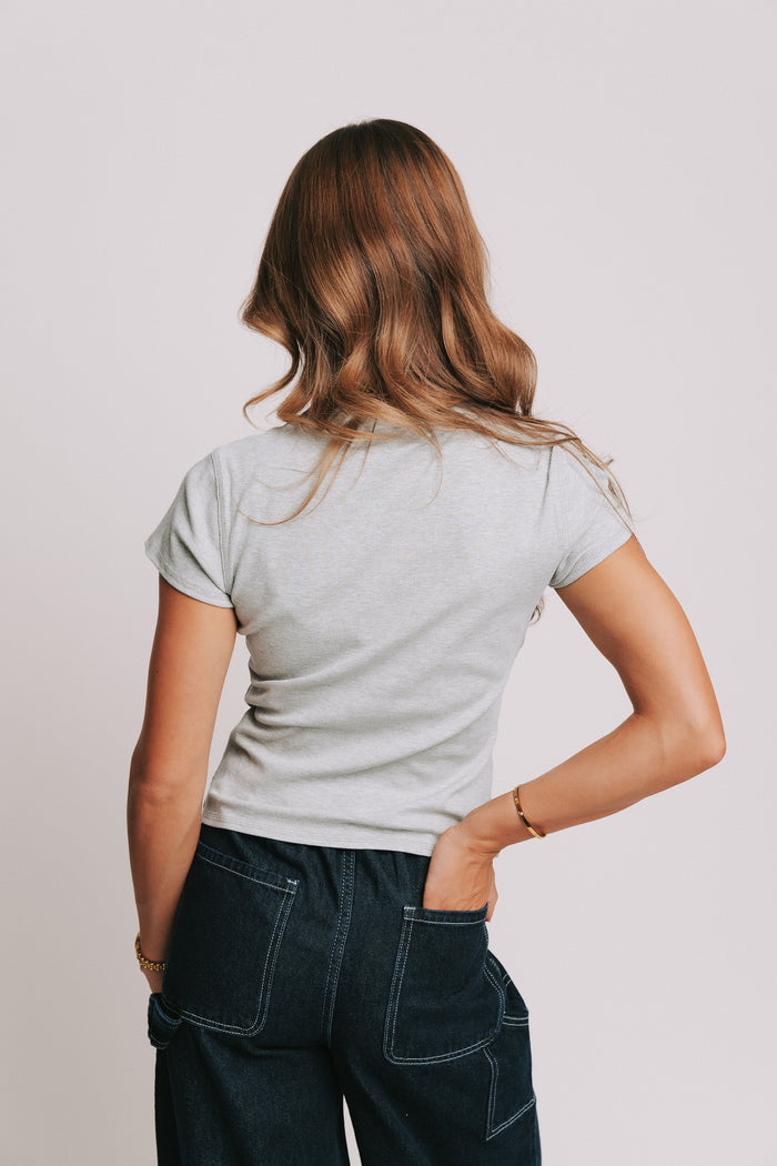 grey ribbed short sleeve top with raw seams back