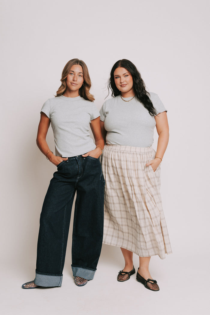 grey ribbed short sleeve top with raw seams models full