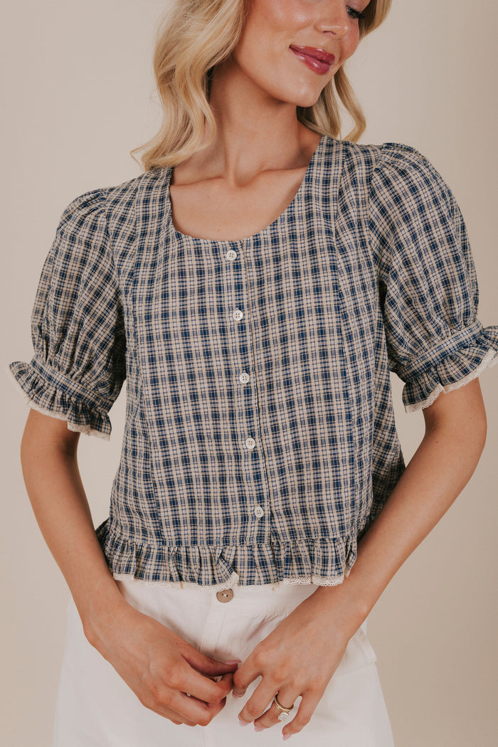 navy button up plaid blouse detail