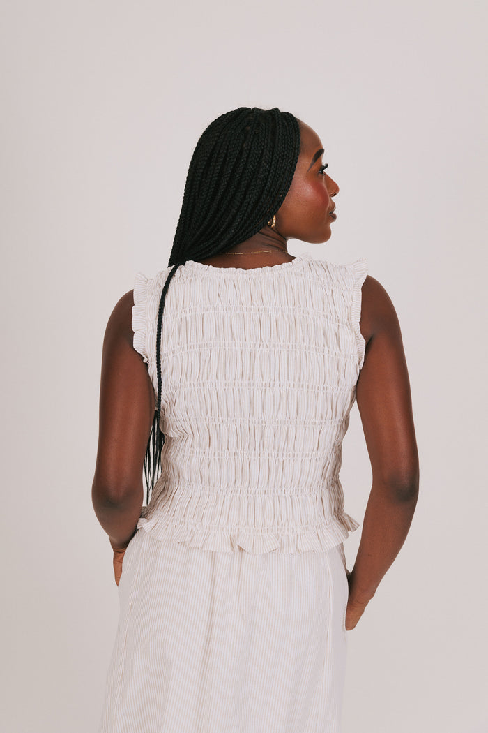 ruched wide shoulder tank with ruffled hem light beige back