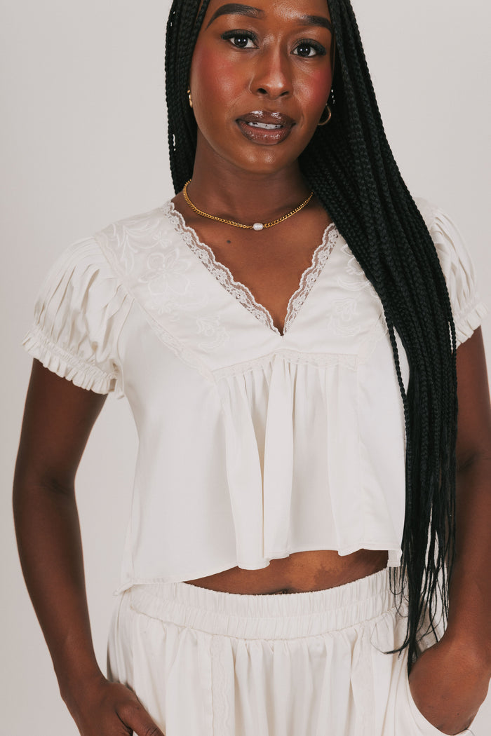 white v neck top with lace detailing