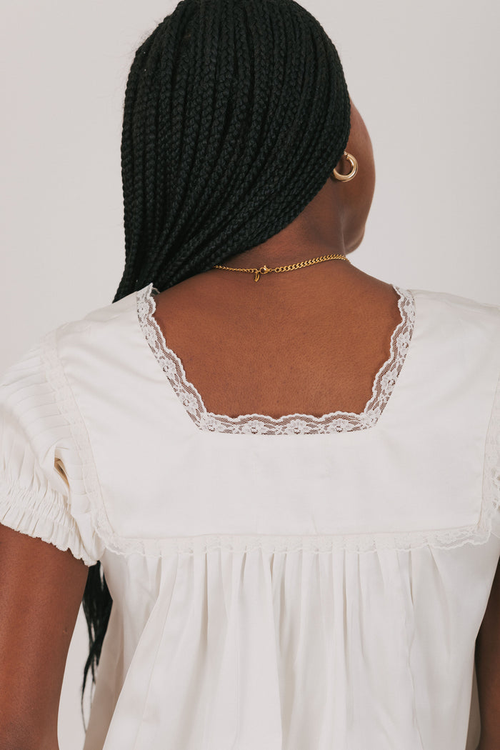 white v neck top with lace detailing back close up
