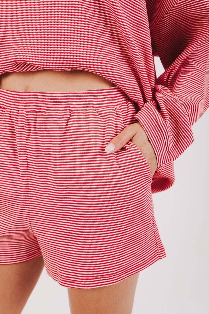 red and white striped elastic waist shorts close