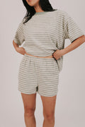 sage striped fleece shorts with pockets and an elastic waistband