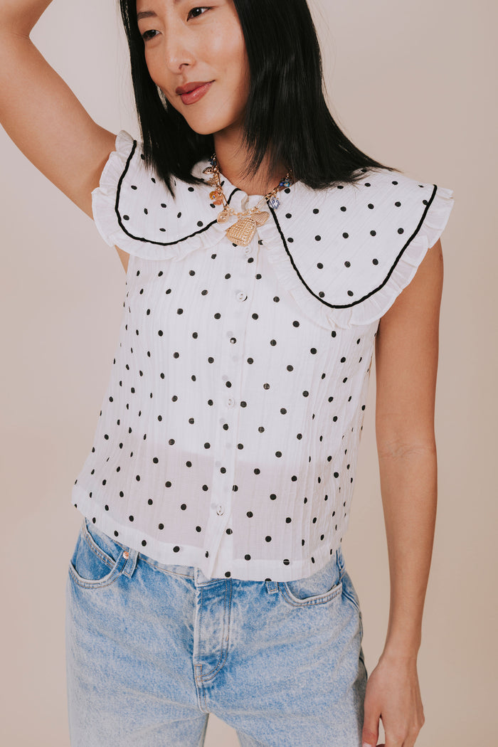 sheer polka dot ruffled collar blouse detail