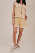 pale yellow ruffle shorts front