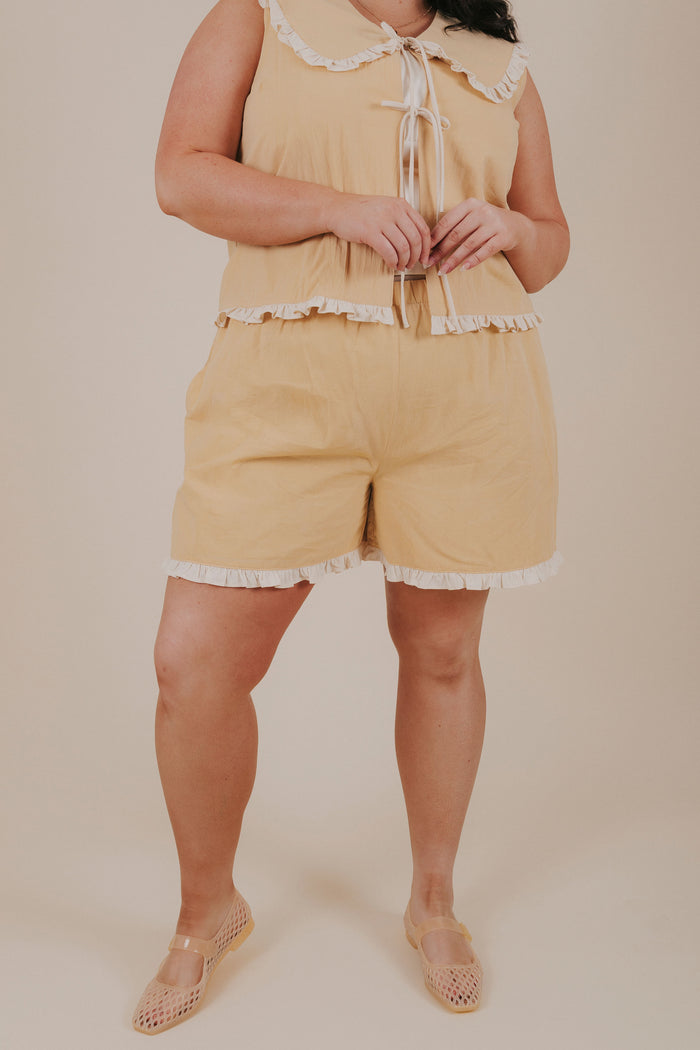 plus size pale yellow ruffle shorts front