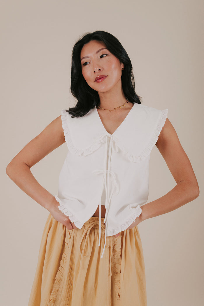 white ruffle tied ruffle top front