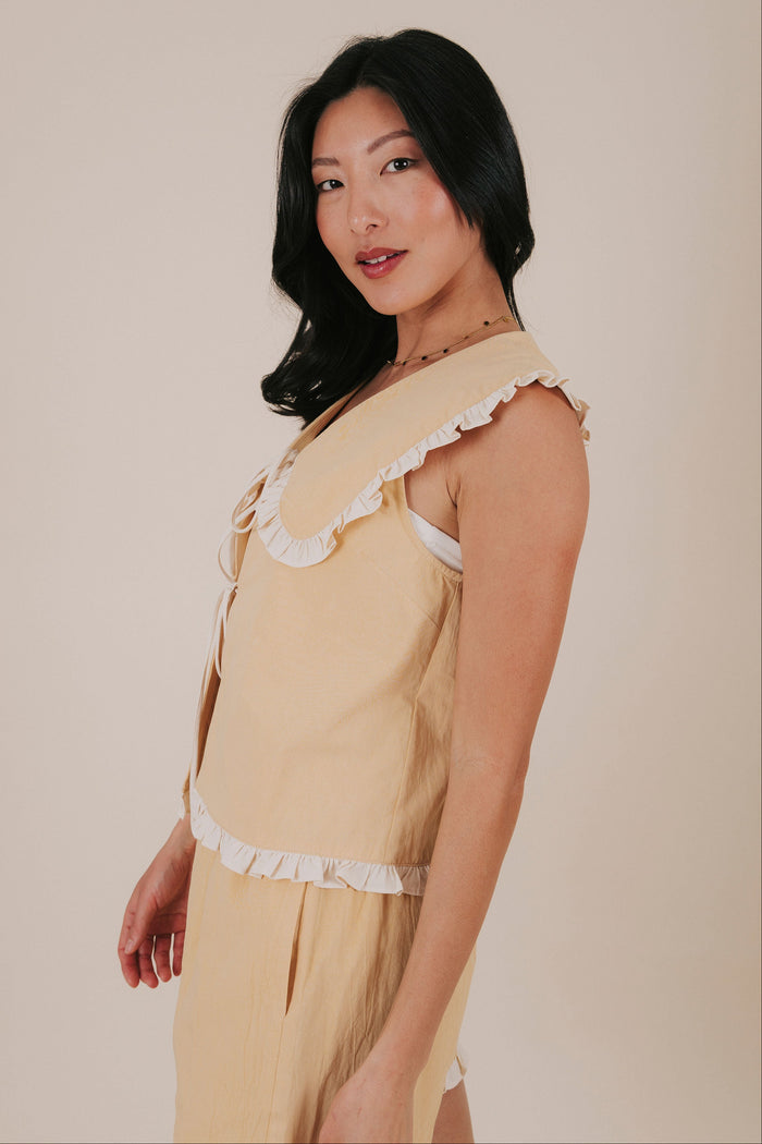 pale yellow ruffle tied ruffle top side