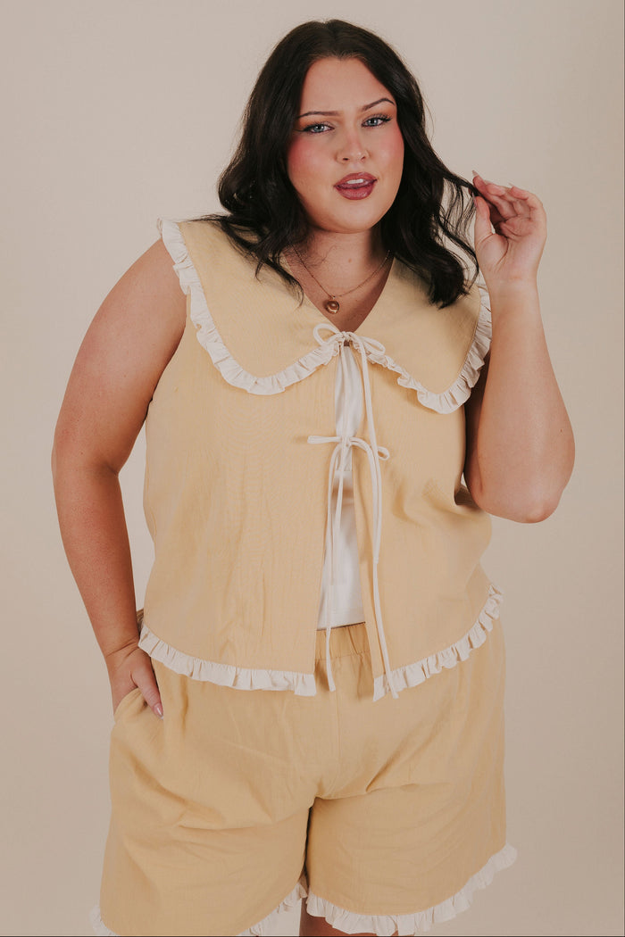 plus size pale yellow ruffle tied ruffle top front