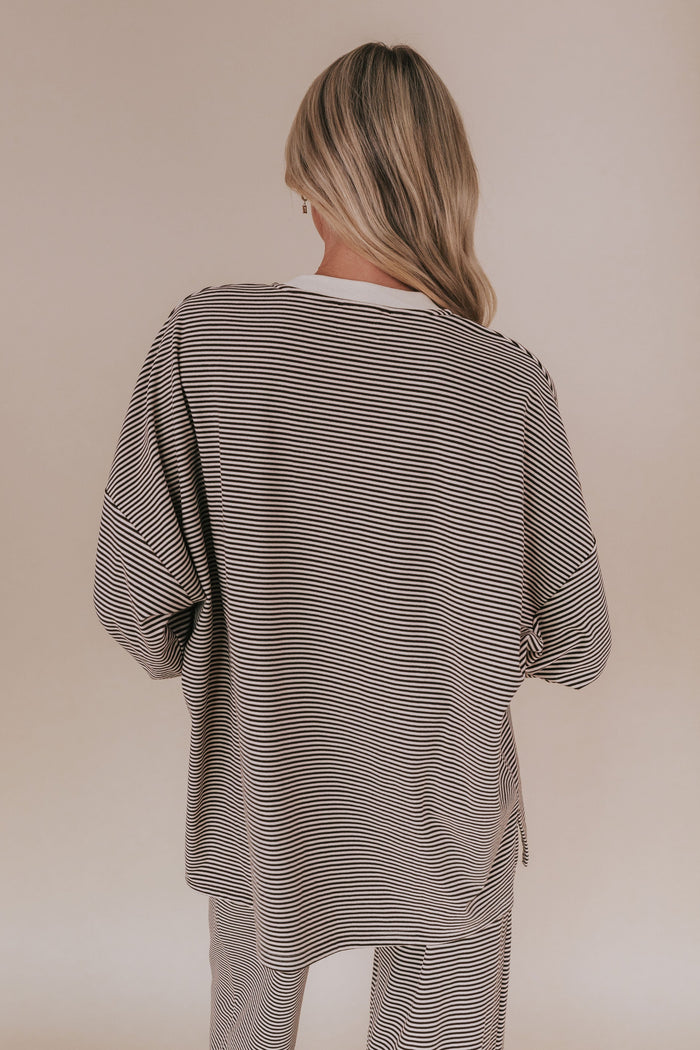 brown and cream oversized long sleeve shirt back