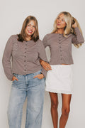 pink and brown striped long sleeve button down top