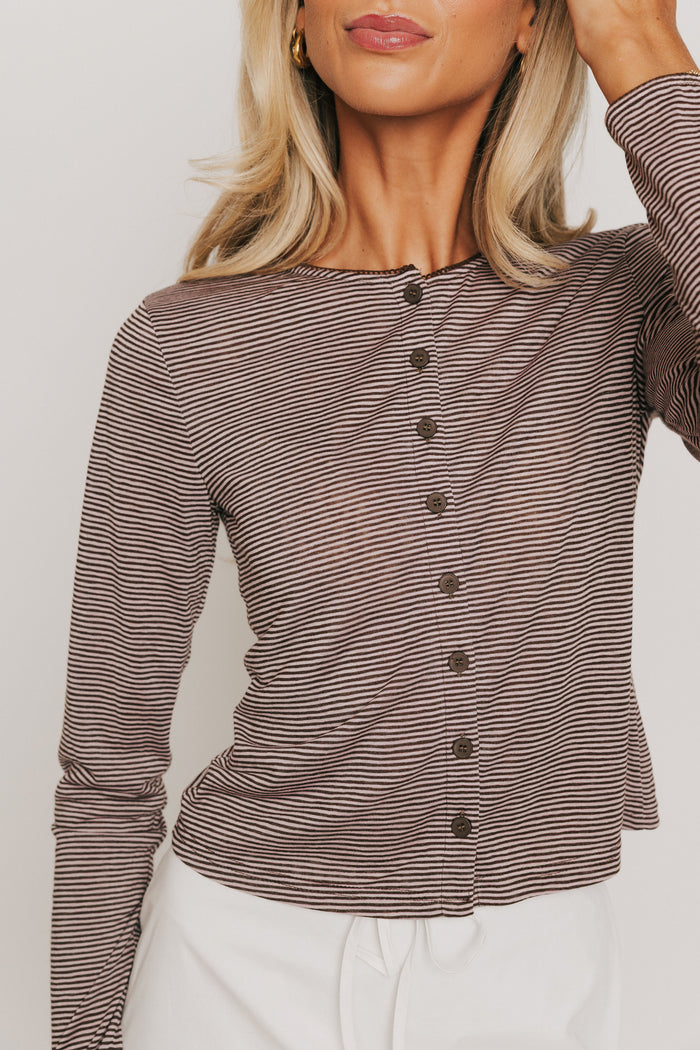 pink and brown striped long sleeve button down top front