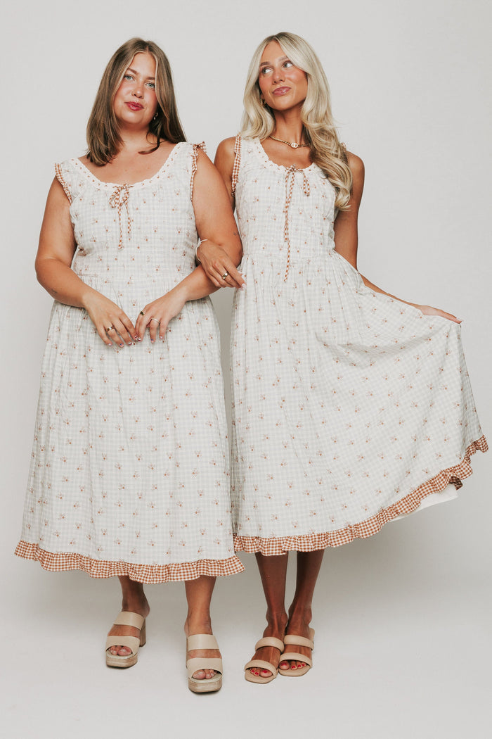 plaid floral midi dress with ruffled gingham trim models full