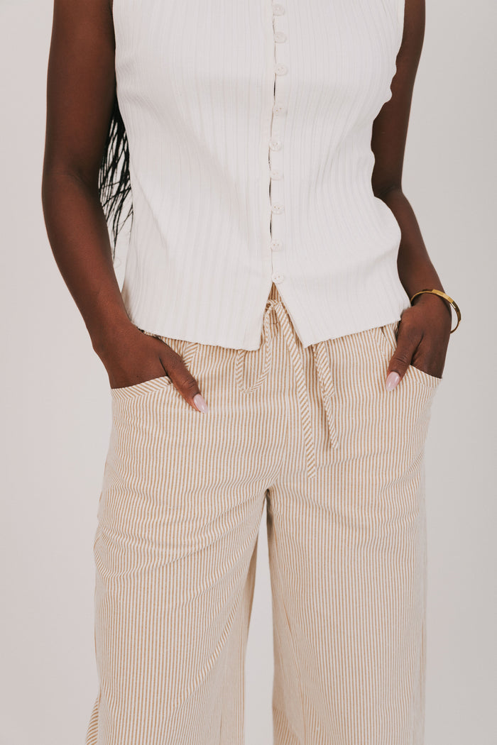 tan and white striped pants with ruffled waist close