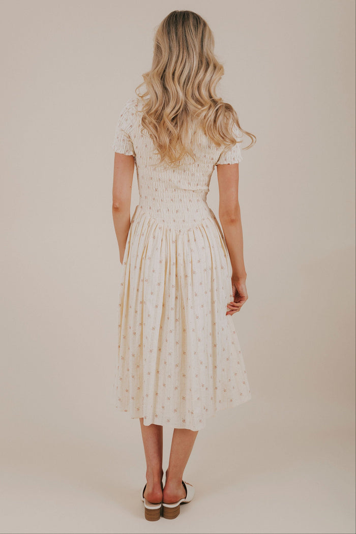butter yellow floral smocked dress back