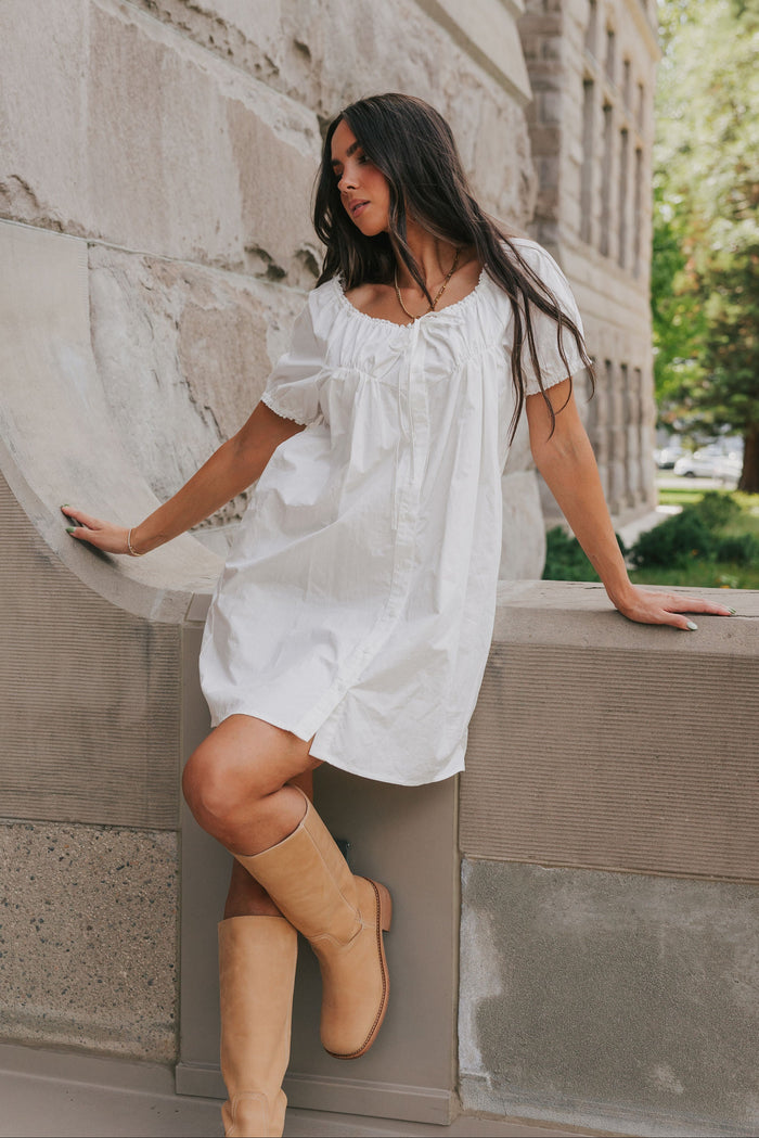 white mini dress with puff sleeves