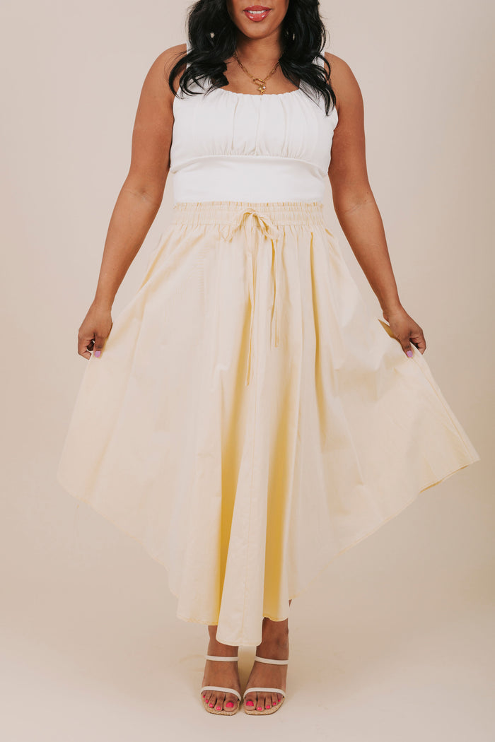 plus size yellow midi skirt with pockets front