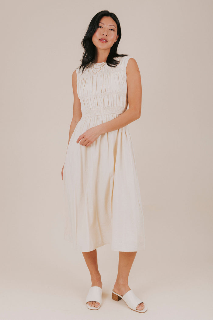 cream smocked striped pockets keyhole midi dress model