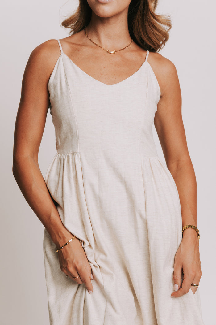 ivory spaghetti strap midi dress with sweetheart neckline close
