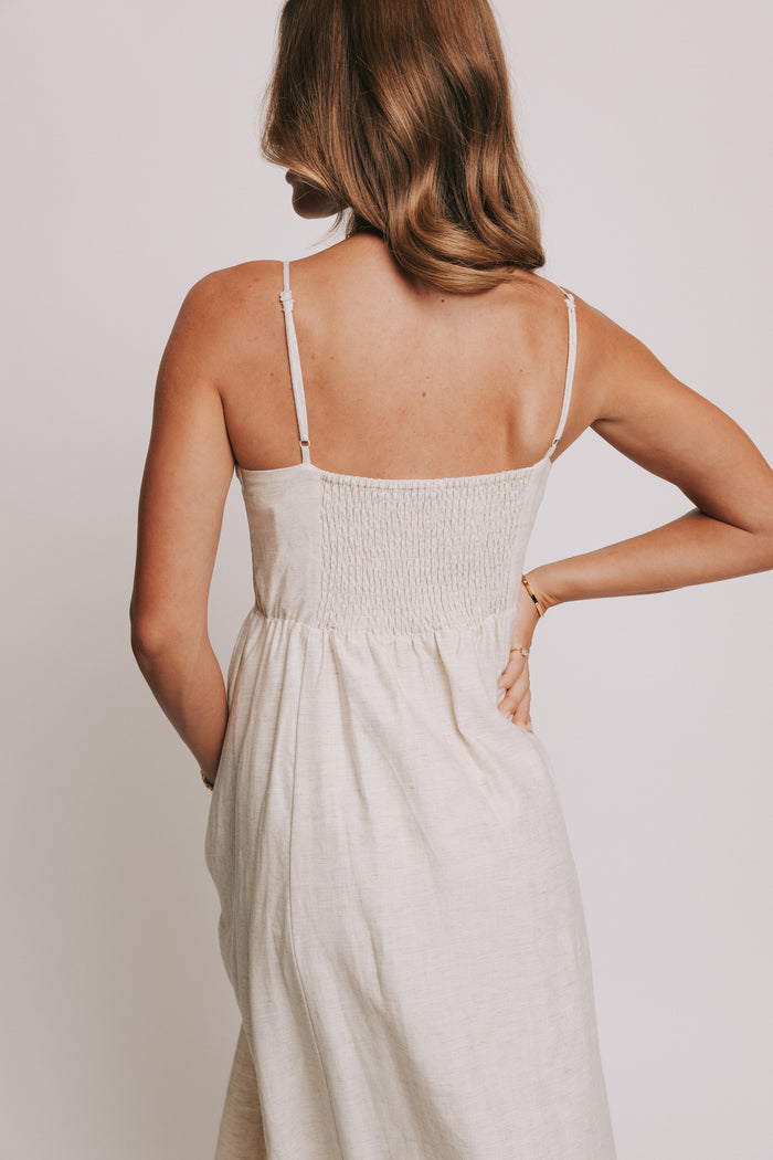 ivory spaghetti strap midi dress with sweetheart neckline back close