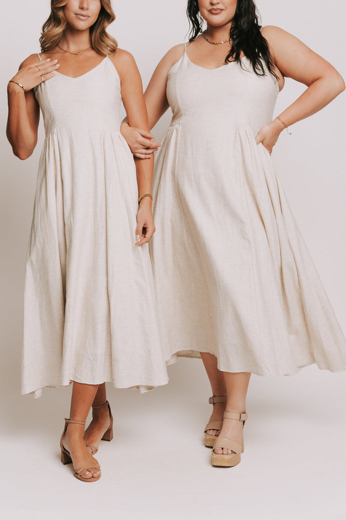 ivory spaghetti strap midi dress with sweetheart neckline models front