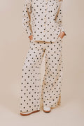 black polka dot wide leg pants front