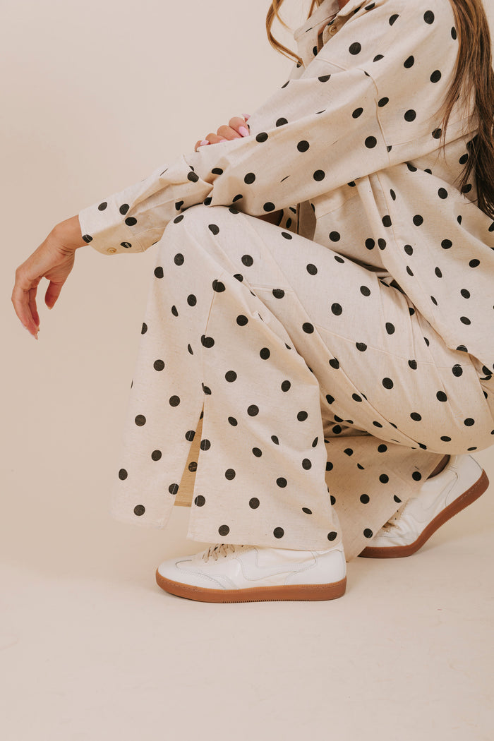 black polka dot wide leg pants detail