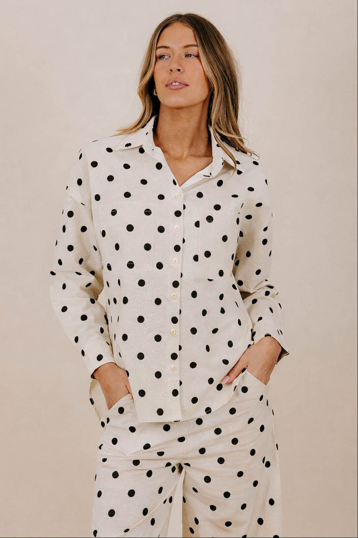 black polka dot button down top front