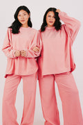 pink and red striped oversized long sleeve top
