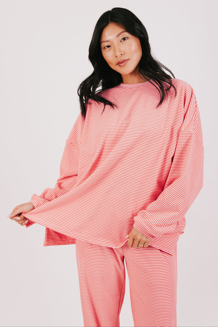 pink and red striped oversized long sleeve top