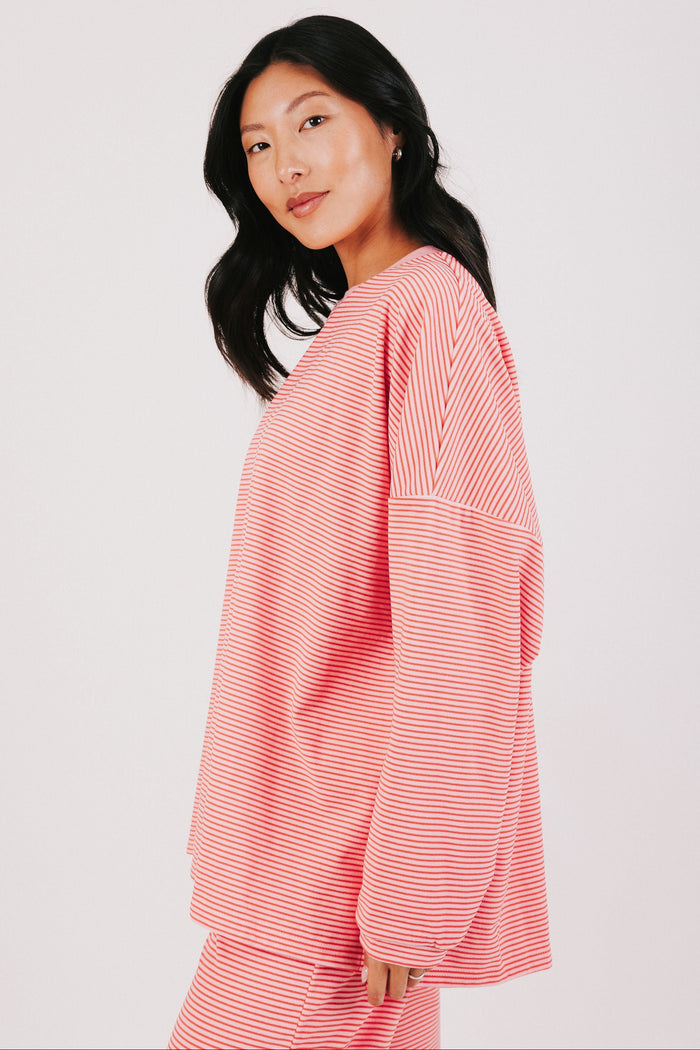 pink and red striped oversized long sleeve top side