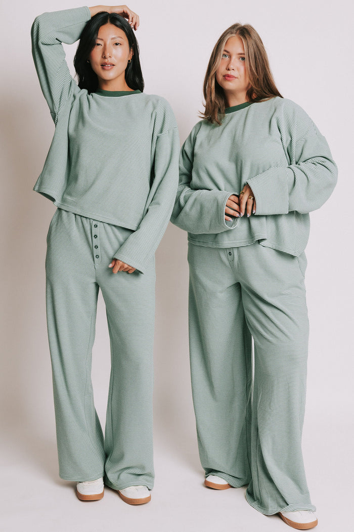 green striped lounge pants with button detail models