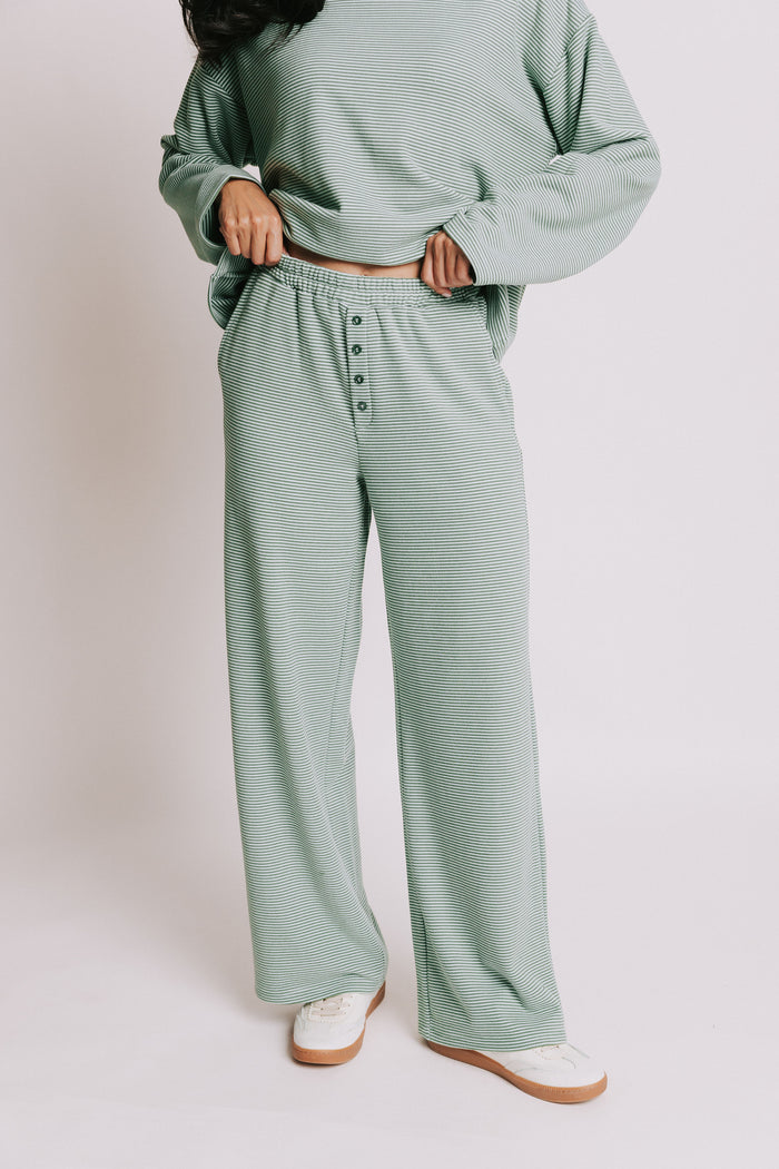 green striped lounge pants with button detail
