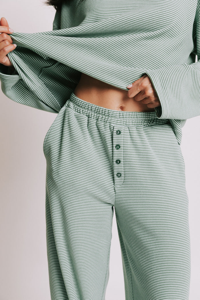 green striped lounge pants with button detail front