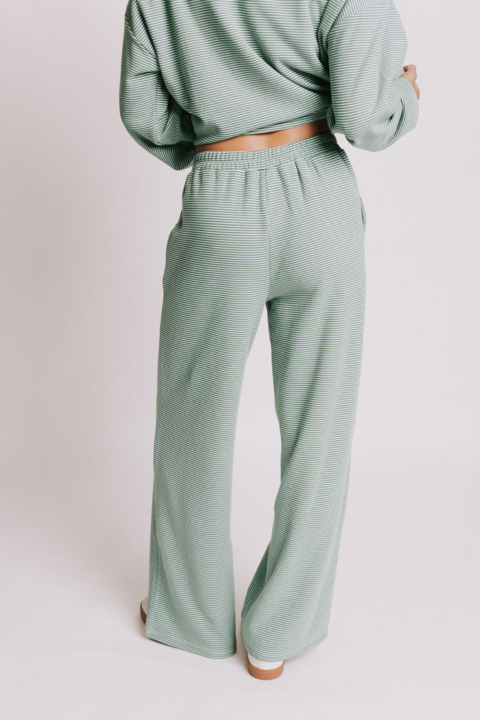 green striped lounge pants with button detail back