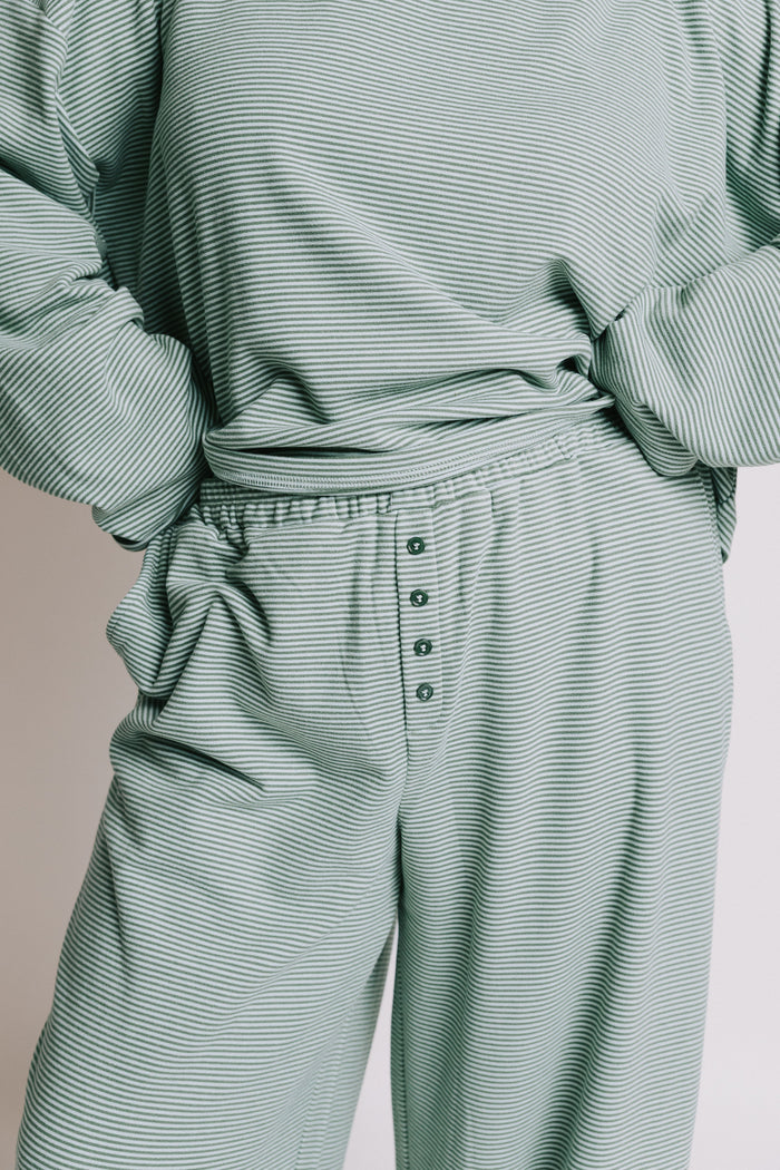 green striped lounge pants with button detail plus front
