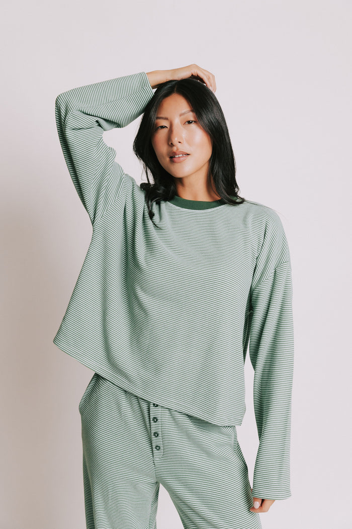 green striped long sleeve top with contrasting neckline