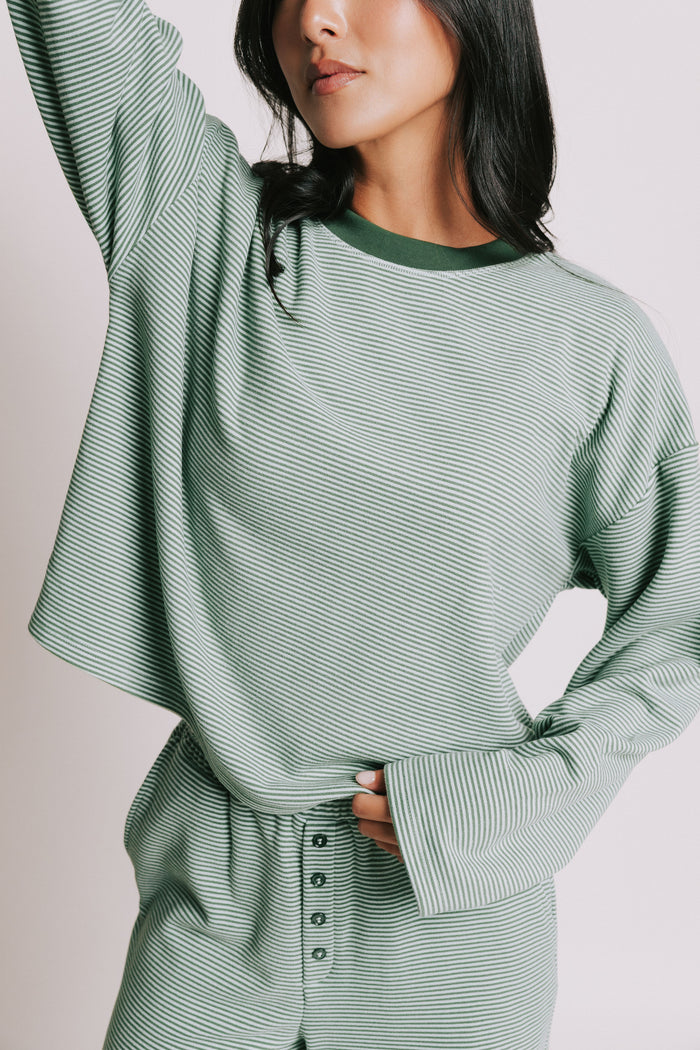 green striped long sleeve top with contrasting neckline front