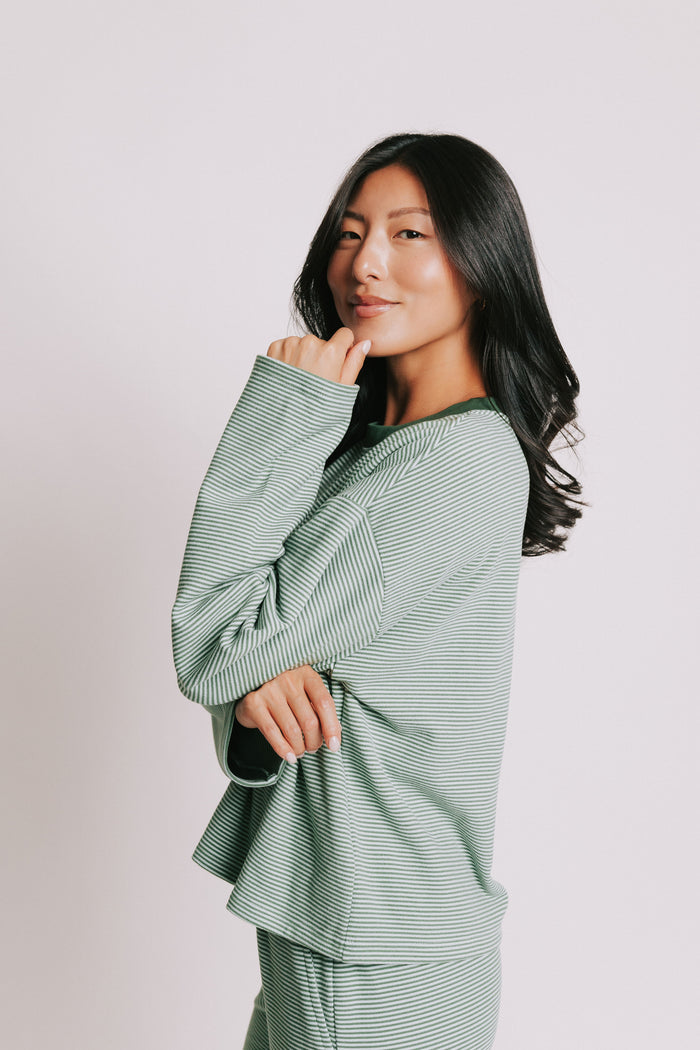 green striped long sleeve top with contrasting neckline side