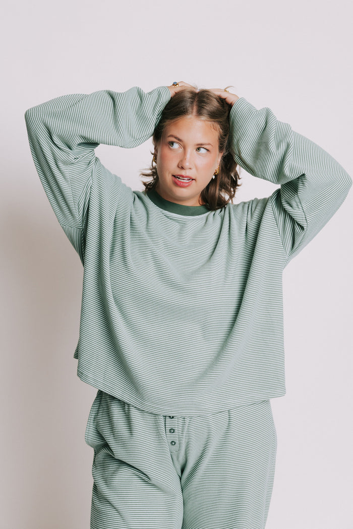 green striped long sleeve top with contrasting neckline plus