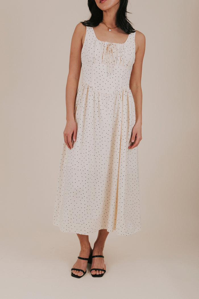 cream polka dot midi dress close