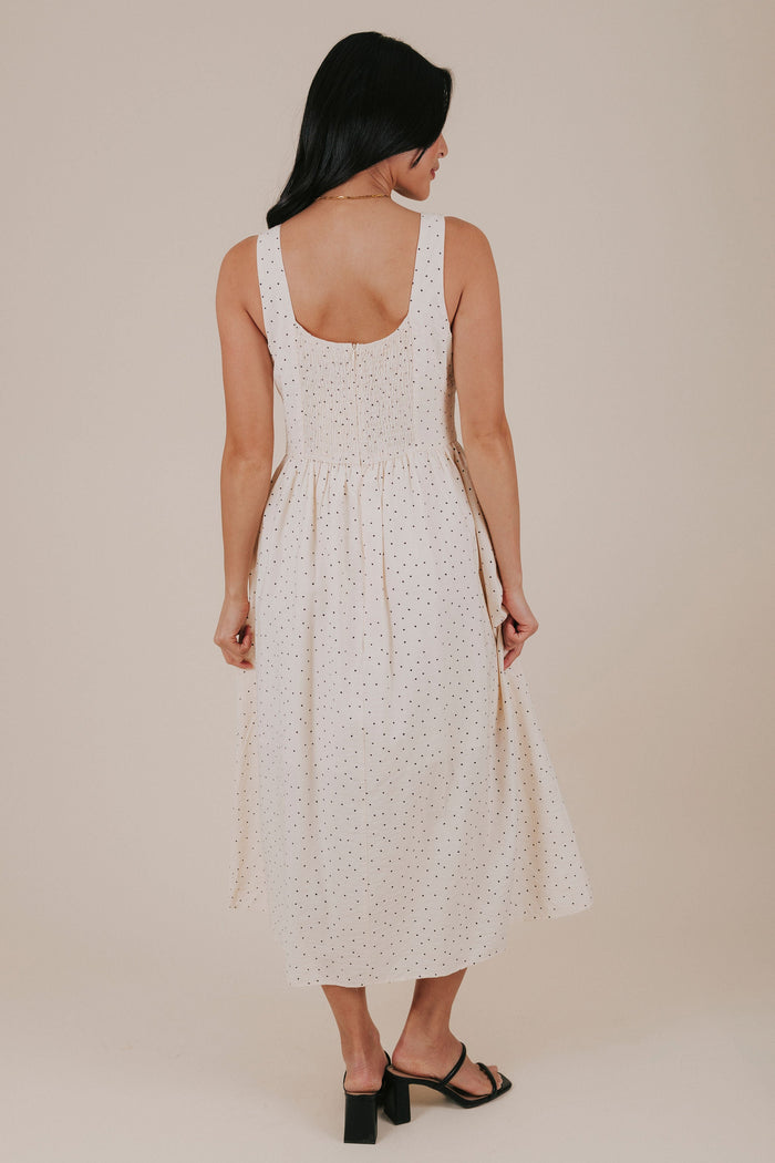 cream polka dot midi dress back